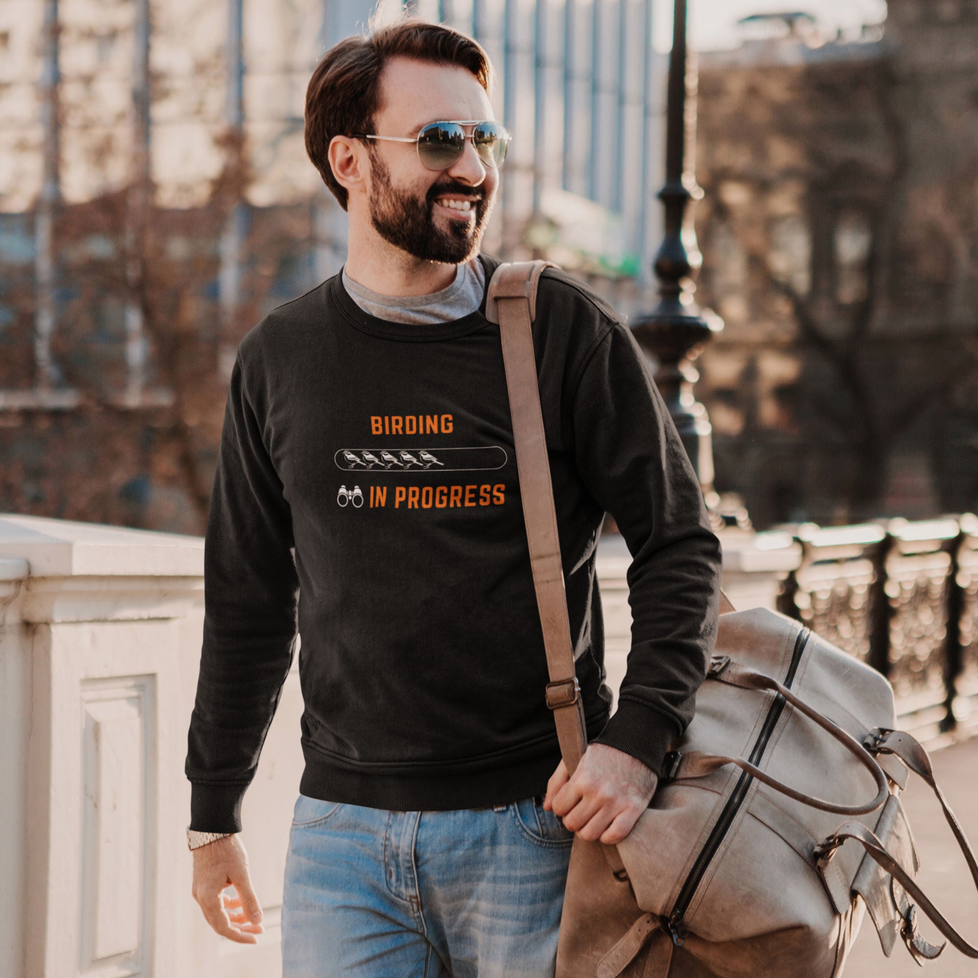 Black birding sweatshirt with the words Birding in Progress on the front around a loading progress bar.