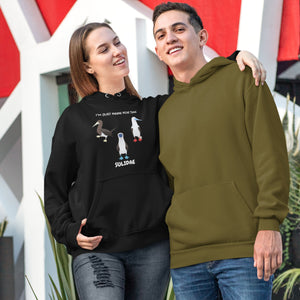 Black birder hoodie with a red-footed, blue-footed and brown booby on it, but referencing only the scientific family name for the bird. Worn by a woman.