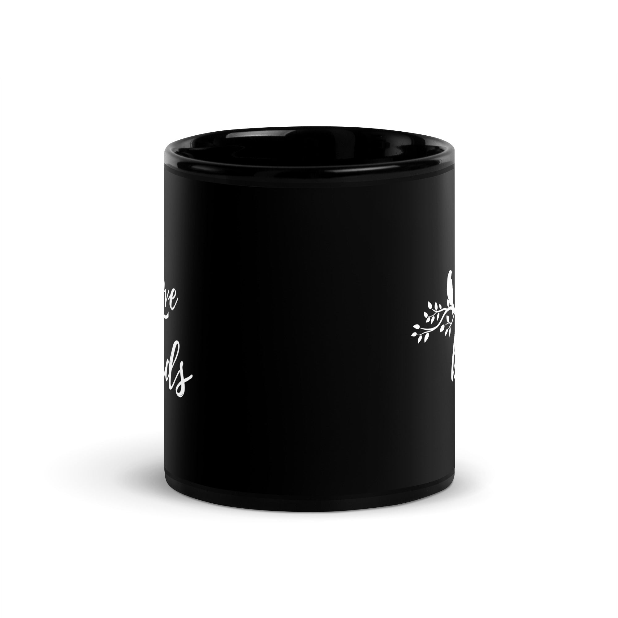 Black 11-ounce mug with the words Love birds and a graphic of a bird on a branch in white.