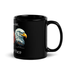 Black 11 oz mug with illustrations of a Great Horned Owl, Peregrine, Red-Tailed Hawk and Bald Eagle and the words "I'm Not Angry, I have RRF. Resting Raptor Face" above and below the birds. Side view left.