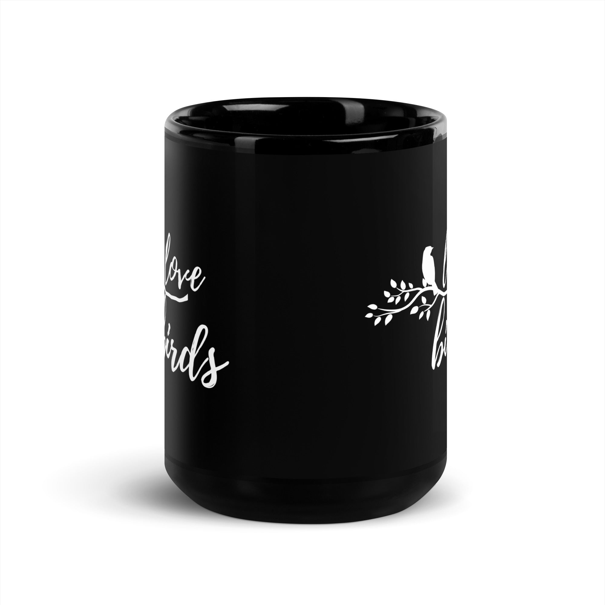 Black 15-ounce mug with the words Love birds and a graphic of a bird on a branch in white.