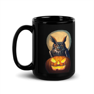 Black 15-ounce bird mug with a great horned owl sitting behind a jack-o-lantern with a full moon rising behind.