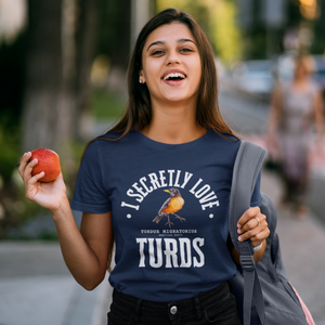 Navy blue bird t-shirt with the words, "I Secretly Love Turds" on the front surrounding an illustration of an American Robin with its common and scientific names.