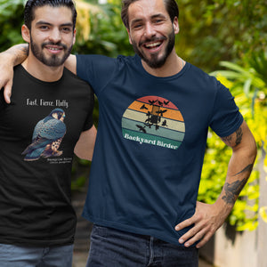 Navy blue bird shirt with a retro sun design outlining a bird feeder with the words Backyard Birder. Worn by a man smiling for a picture with his buddy.