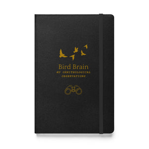 Hard bound journal in black with the words, "Bird Brain, My Ornithological Observations" on the cover with a few flying birds above and a pair of binoculars below.