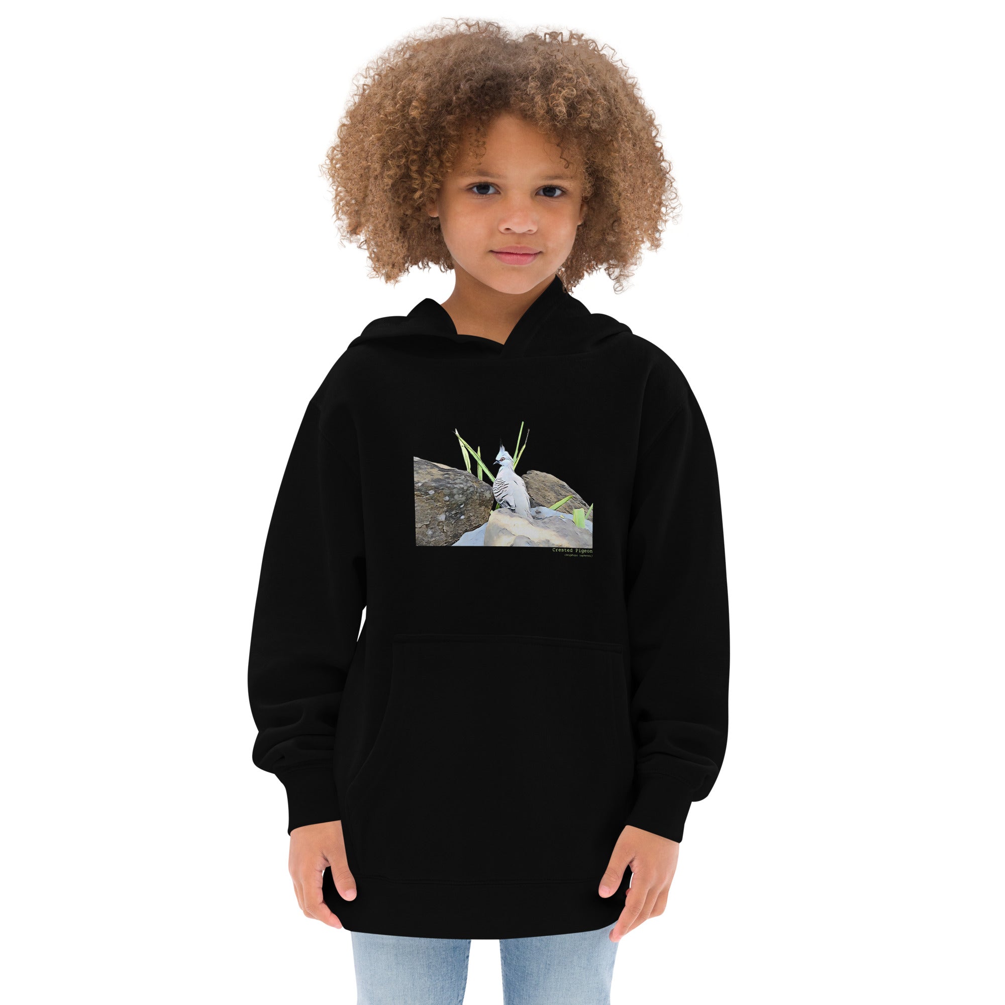 Black unisex youth bird hoodie with a graphic of a crested pigeon among some rocks and grass on front, and the words crested pigeon written below and the scientific name below that.