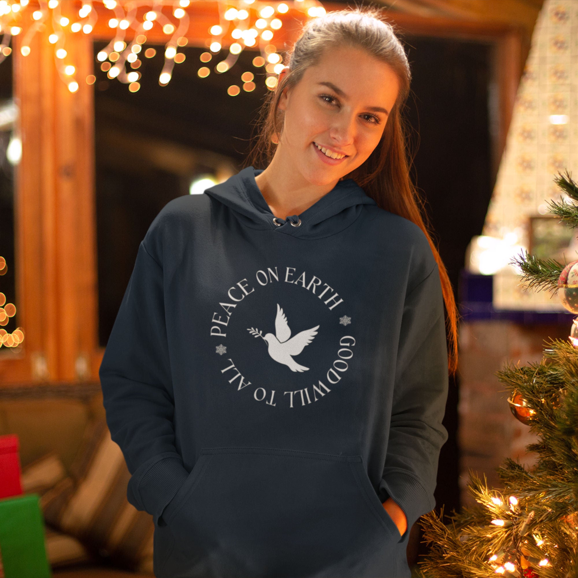 Navy blue unisex hoodie that says Peace on Earth Goodwill to All in a circle surrounding a dove of peace.