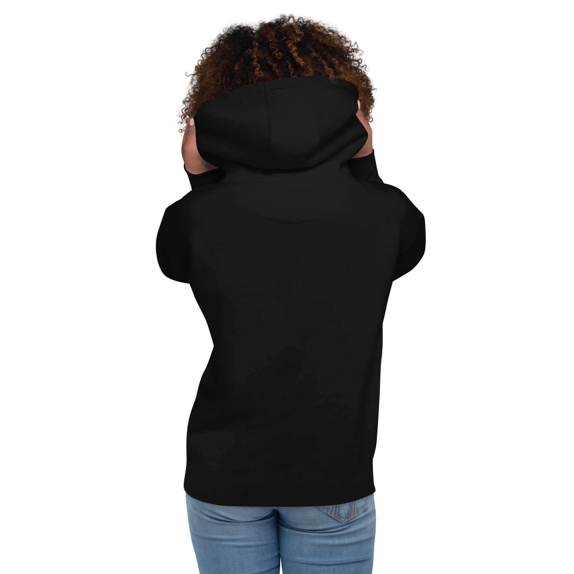 Unisex black birding hoodie celebrating bird watching and overlanding with a graphic of binoculars, a bird, and an overlanding vehicle. Worn by a woman, rear view, graphics not seen.