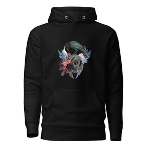 Black unisex bird hoodie with a crow holding a heart pendant, perched upon a skull, surrounded by wings and flowers.