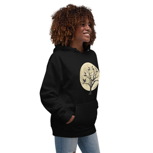 Black bird hoodie with a full moon outlining a heron rookery.  Worn by a woman.