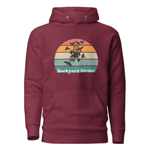 Maroon bird hoodie with a retro sun design outlining a bird feeder with the words Backyard Birder.