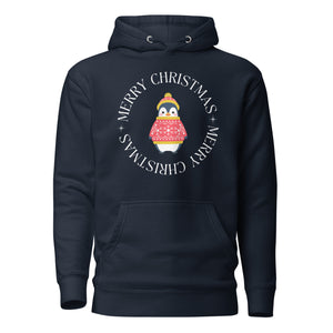 Navy blue unisex hoodie with Merry Christmas on the front in a circle that surrounds a cute penguin in a hat and a sweater.