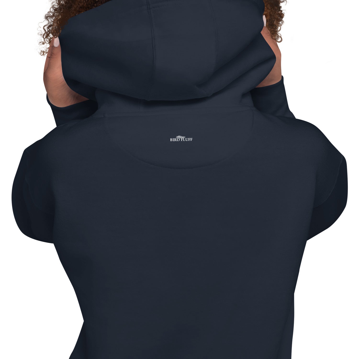 Navy blue unisex birding hoodie that has silhouettes of a man and a woman using binoculars overlayed on a stack of the word Birds with the saying, "Never Stop Birding" at the bottom and colorful silhouette of different birds at the top. Rear view of brand logo beneath hood.