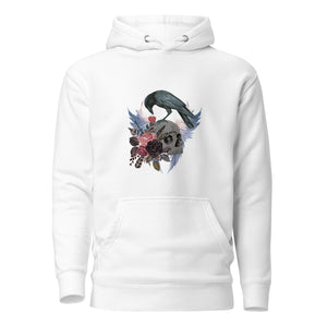 White unisex bird hoodie with a crow holding a heart pendant, perched upon a skull, surrounded by wings and flowers.