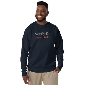 Navy blue unisex bird sweatshirt with the words Nerdy for them birdies on the front in two coordinating fonts and colors. Worn by a man.