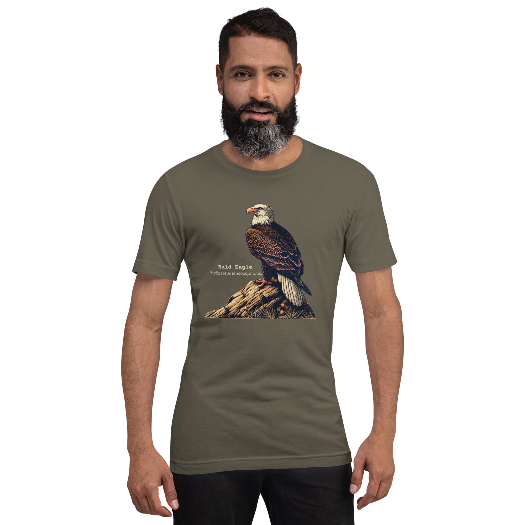 Army green unisex bird shirt with a Bald Eagle perched on a rock, next to its common and scientific names. Worn by a man.