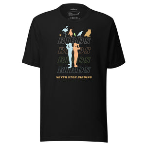 Black unisex birding t-shirt that has silhouettes of a man and a woman using binoculars overlayed on a stack of the word Birds with the saying, "Never Stop Birding" at the bottom and colorful silhouette of different birds at the top.