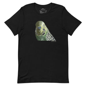 Black unisex t-shirt with an illustrated and lifelike graphic of a green and yellow parakeet or budgie on the front. Below and to the right of the picture is the word Budgerigar and below that the scientific name in parenthesis in small print.