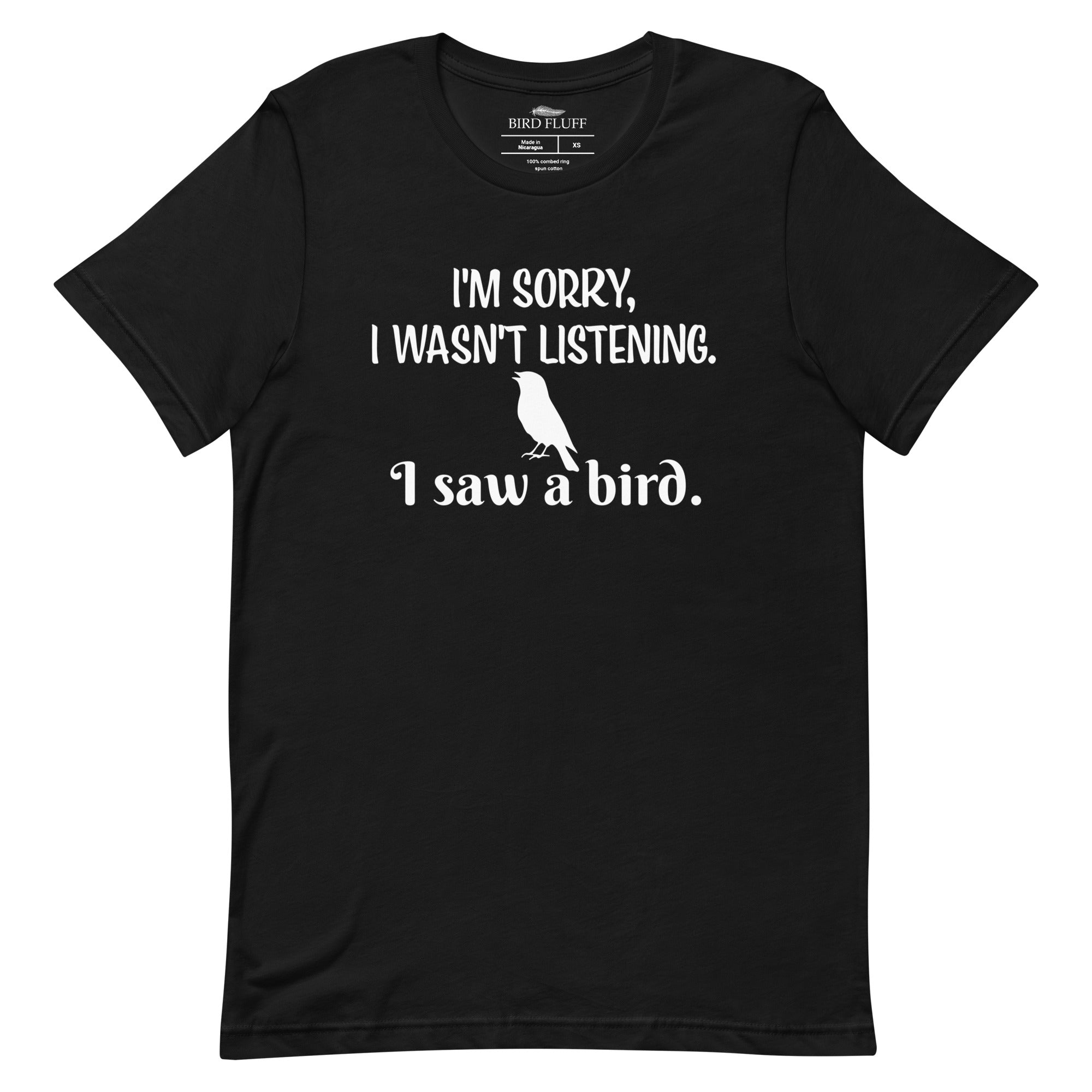 Black unisex bird t-shirt with the words I'm sorry I wasn't listening, I saw a bird. And a graphic of a songbird.