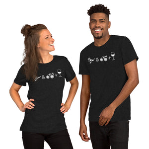 Unisex dark heather black bird t-shirt celebrating bird watching and wine drinking with a graphic of binoculars, a bird, and a glass of wine. Worn by a happy couple.