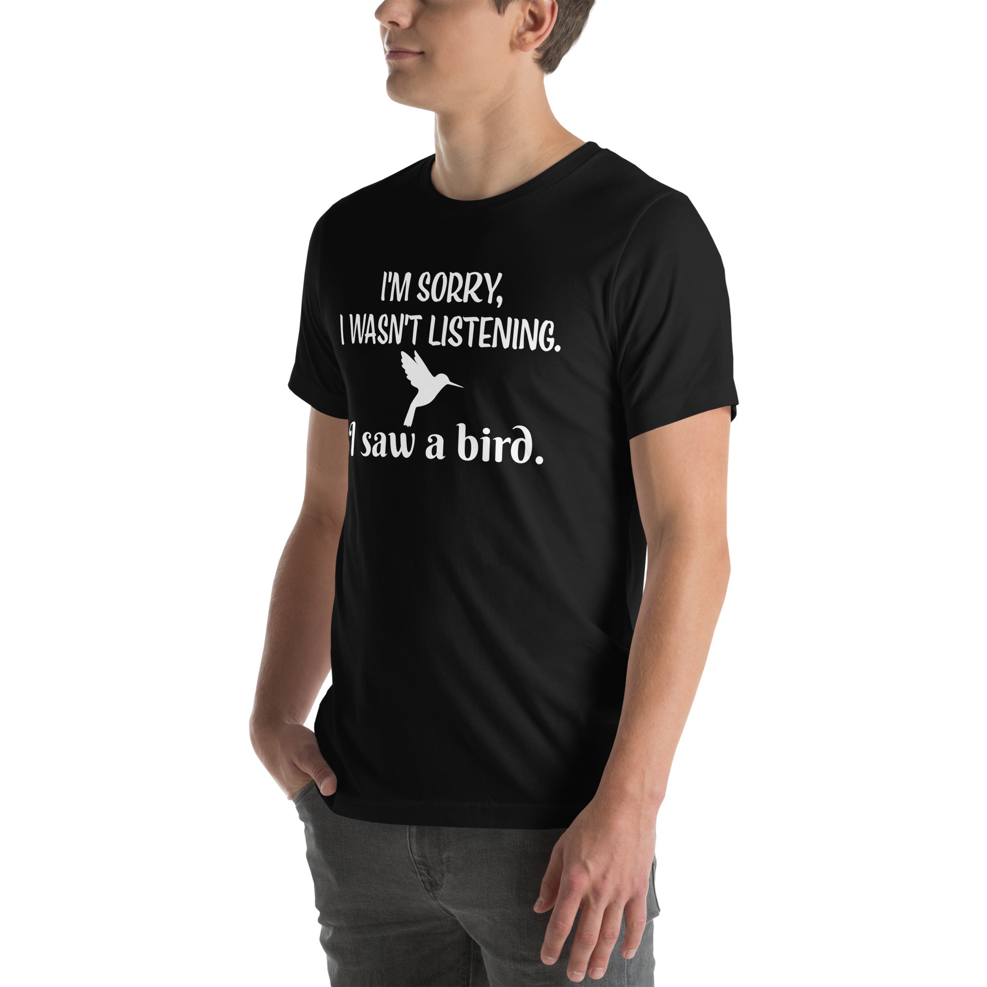 Black bird t-shirt with the words I'm sorry I wasn't listening, I saw a bird. And a graphic of a hummingbird flying. 