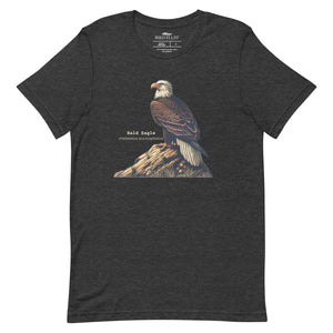 Dark Gray heather unisex bird shirt with a Bald Eagle perched on a rock, next to its common and scientific names.