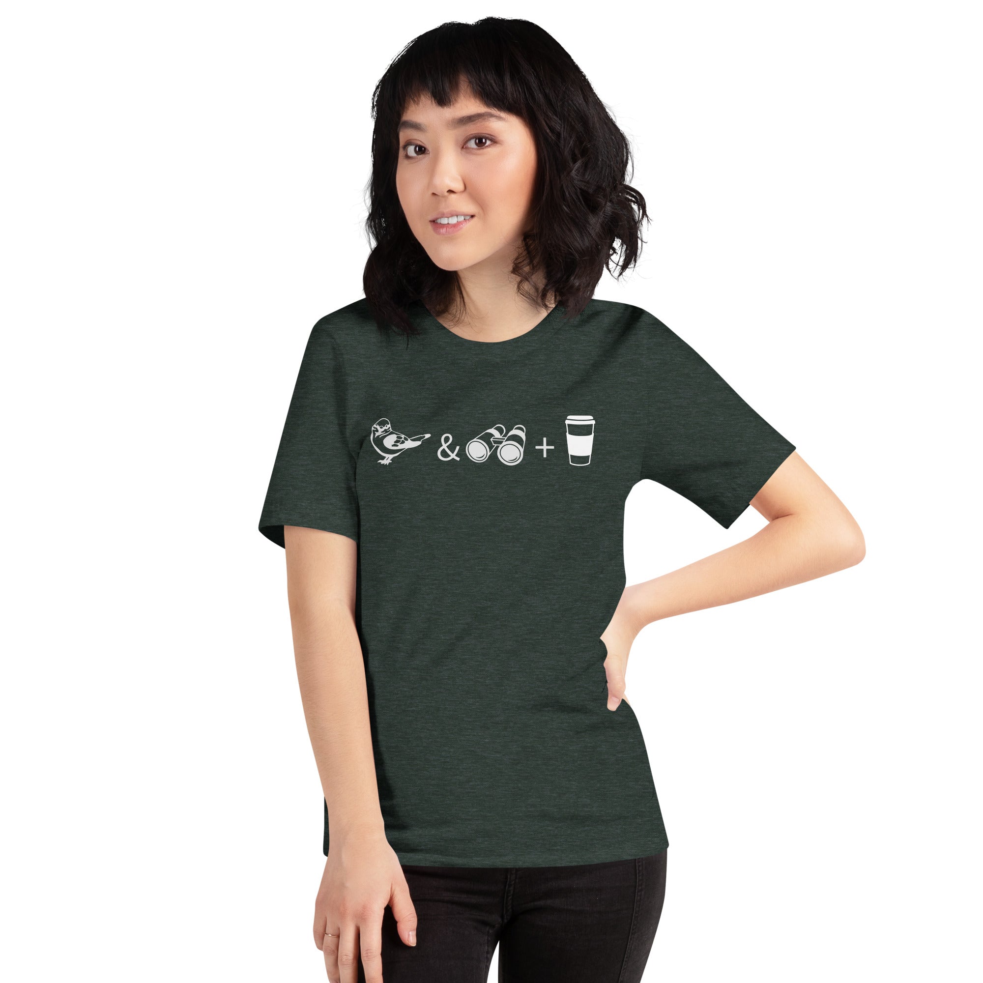 Forest green heather bird shirt with a bird, binoculars and cup of coffee. Worn by a woman.