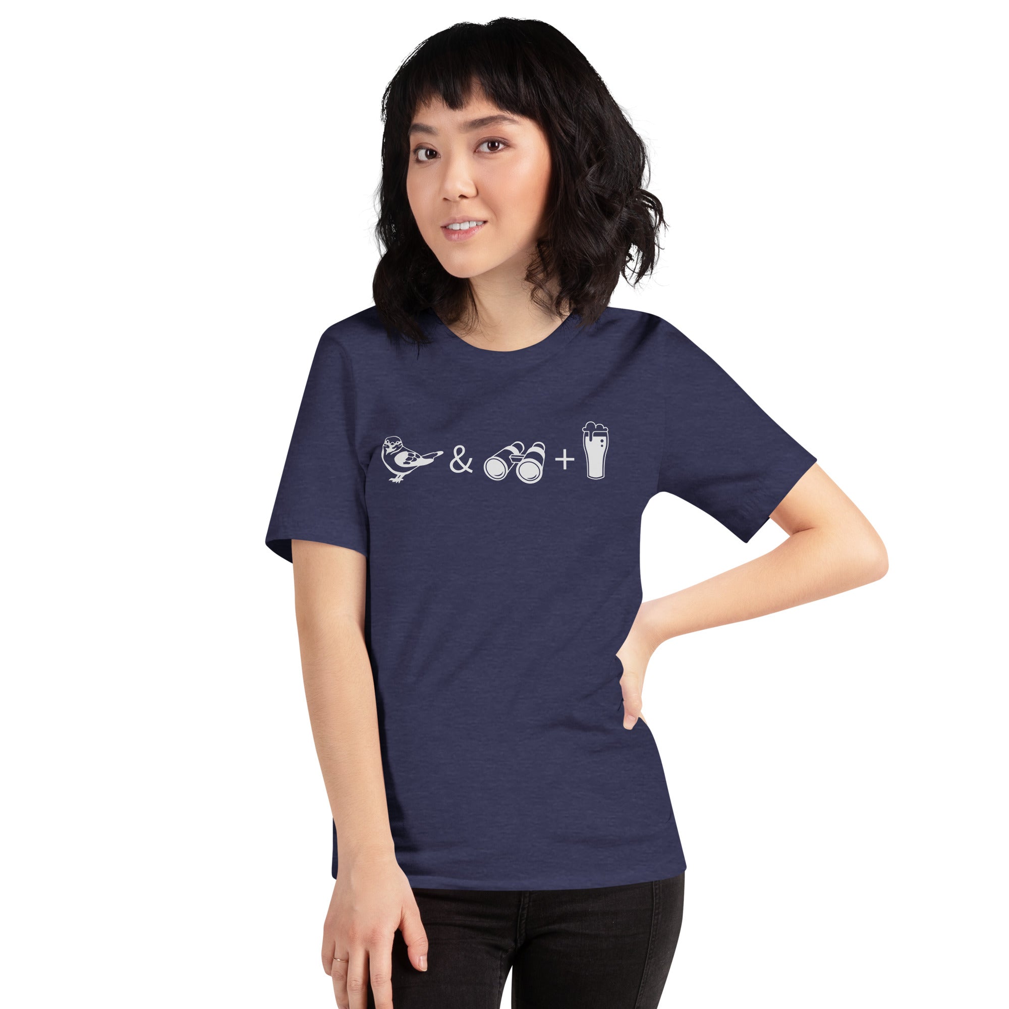 Unisex dark heather blue bird t-shirt celebrating bird watching and beer with a graphic of binoculars, a bird, and a glass of beer. Worn by a woman.