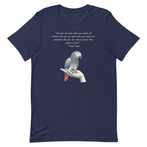 Navy bird shirt with a Mark Twain woman who keeps parrot quote and a illustration of an african grey parrot perched on a hand beneath.