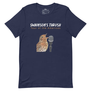 Navy unisex bird shirt mimicking a concert t-shirt with the words "Swainson's Thrush" and below that, "Tour of the Americas" and below that an illustrated Swainson's thrush singing into a microphone. Back of shirt, (not shown) has concert dates and cities where this bird can be heard.