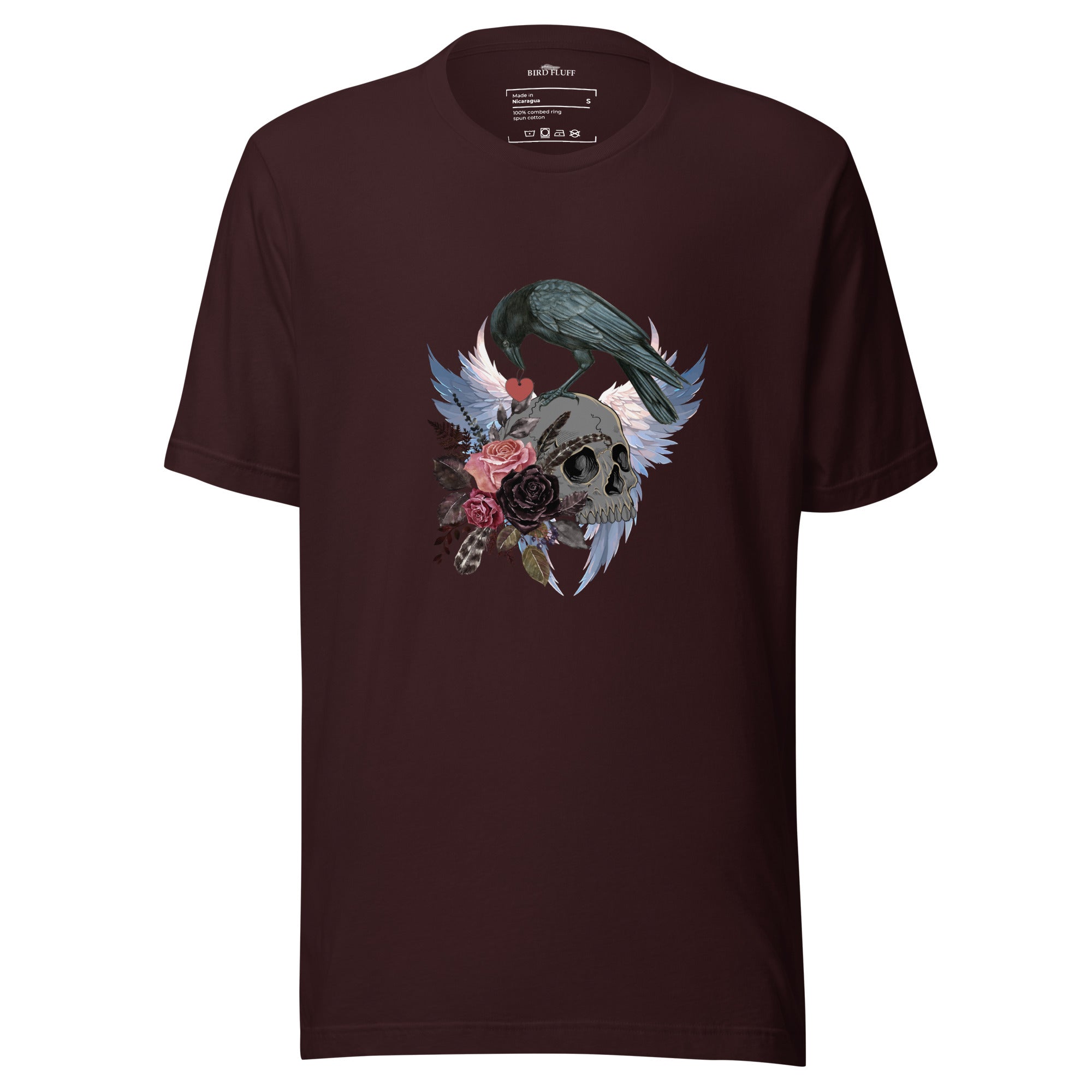 Gothic themed oxblood black bird shirt with a crow carrying a heart pendant, perched on a skull surrounded by flowers, feathers and wings.