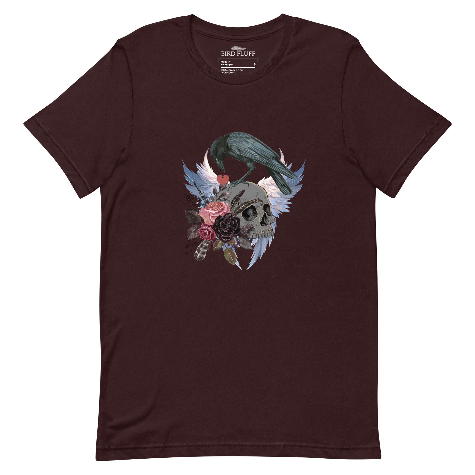 Gothic themed oxblood black bird shirt with a crow carrying a heart pendant, perched on a skull surrounded by flowers, feathers and wings.