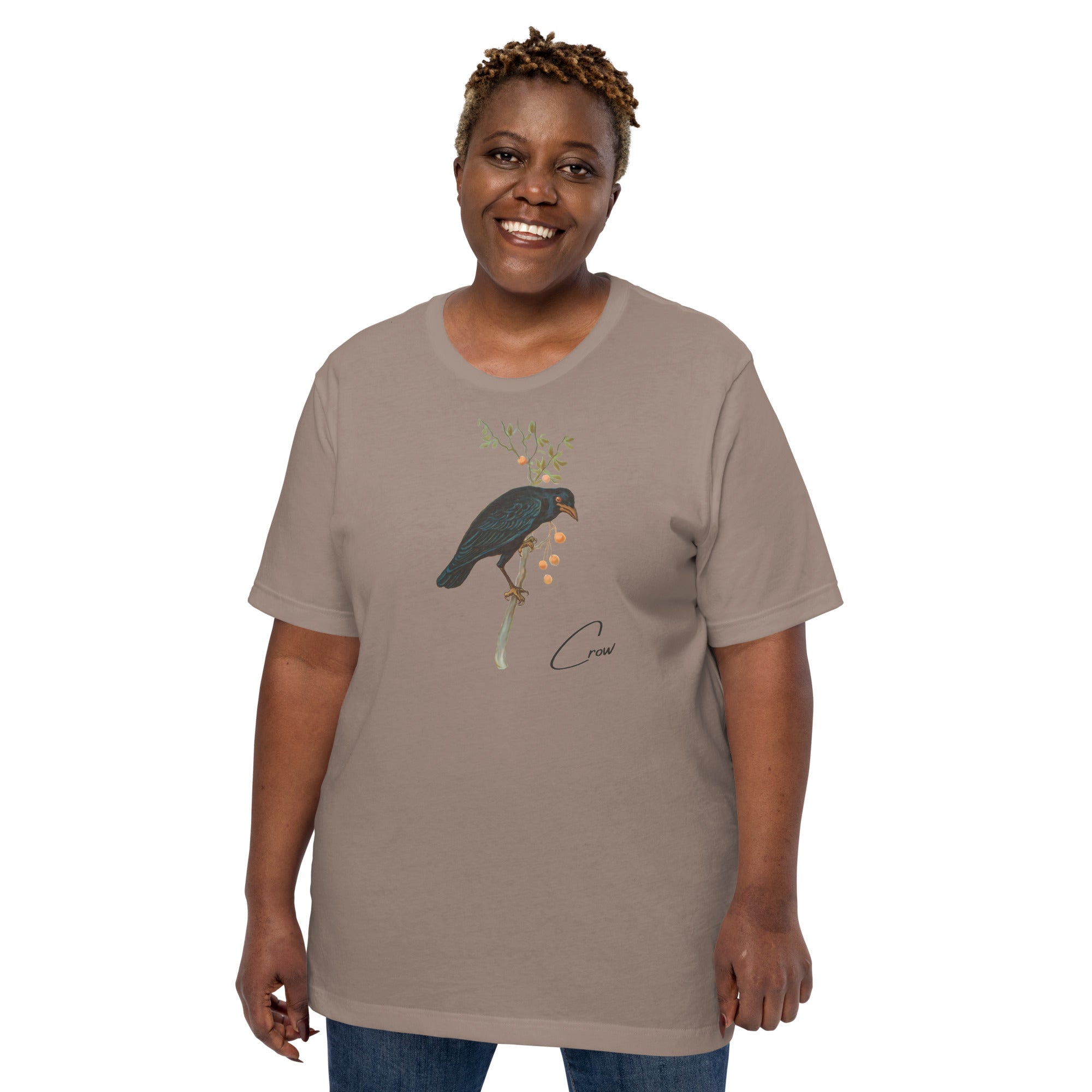 Grey beige bird shirt with vintage artwork of a crow and the word "Crow" written on the bottom left. Worn by a woman.