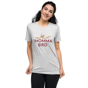 White fleck premium bird t-shirt with a bird graphic and the words The Momma Bird on the front, worn by a female model.