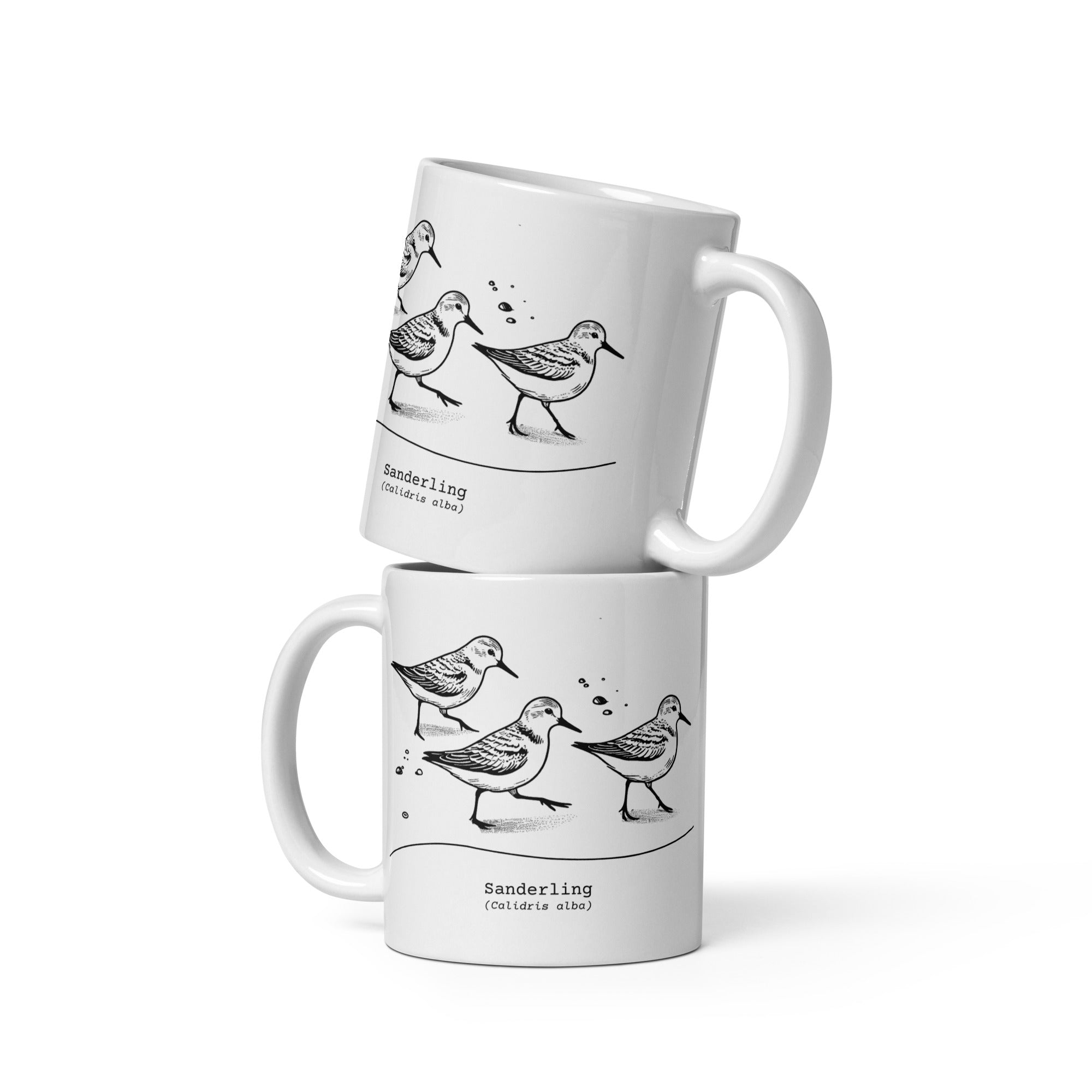 White 20-ounce mug featuring an illustration of a three sanderlings on a beach and the common and scientific names for the bird underneath.