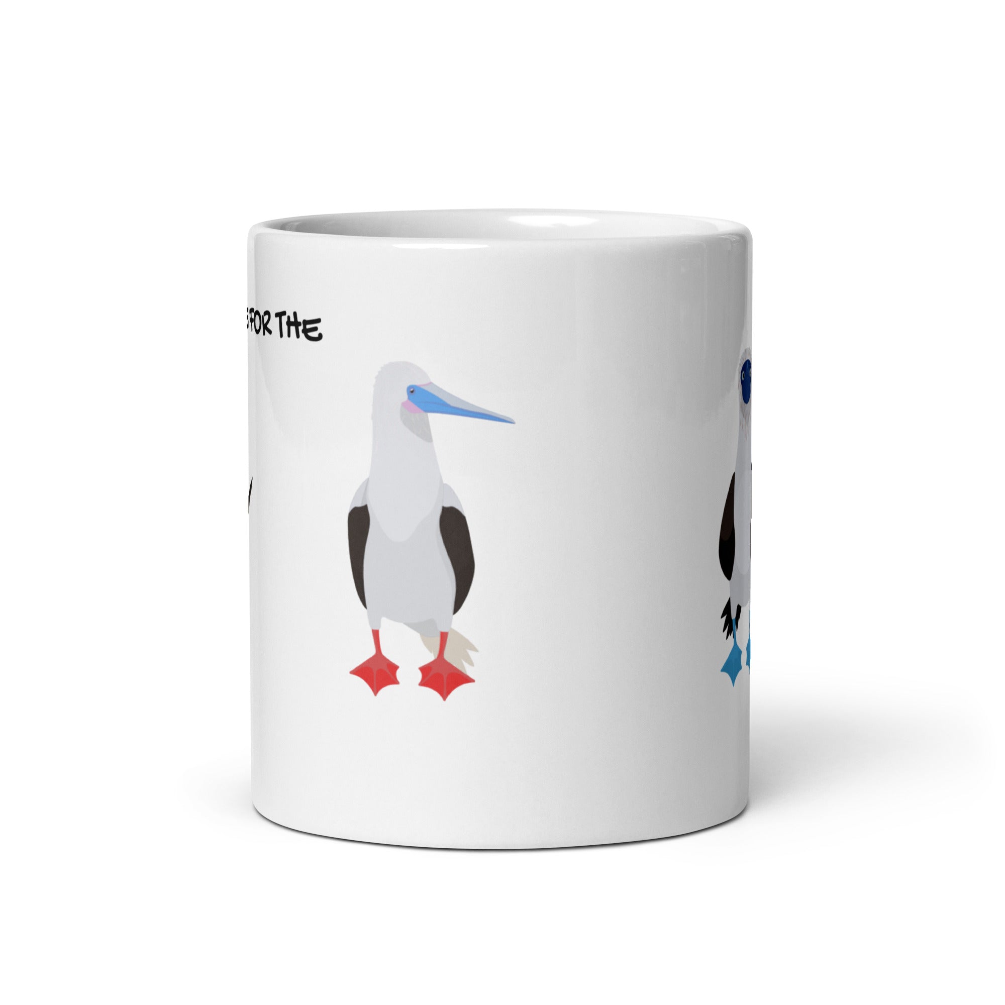 white glossy 11 ounce mug with illustrations of the blue-footed, red-footed and brown booby and the words, "I'm just here for the Sulidae." Mug handle in back and not shown.