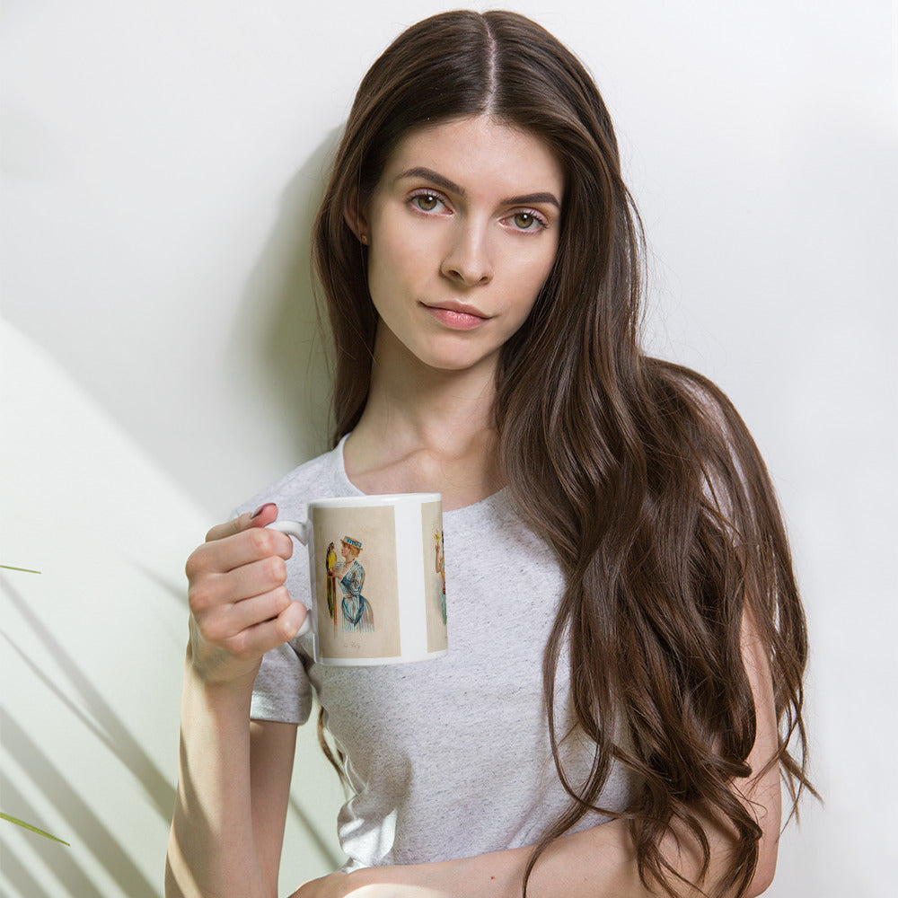 Woman relaxing with a bird themed coffee mug whilst staring at the camera.