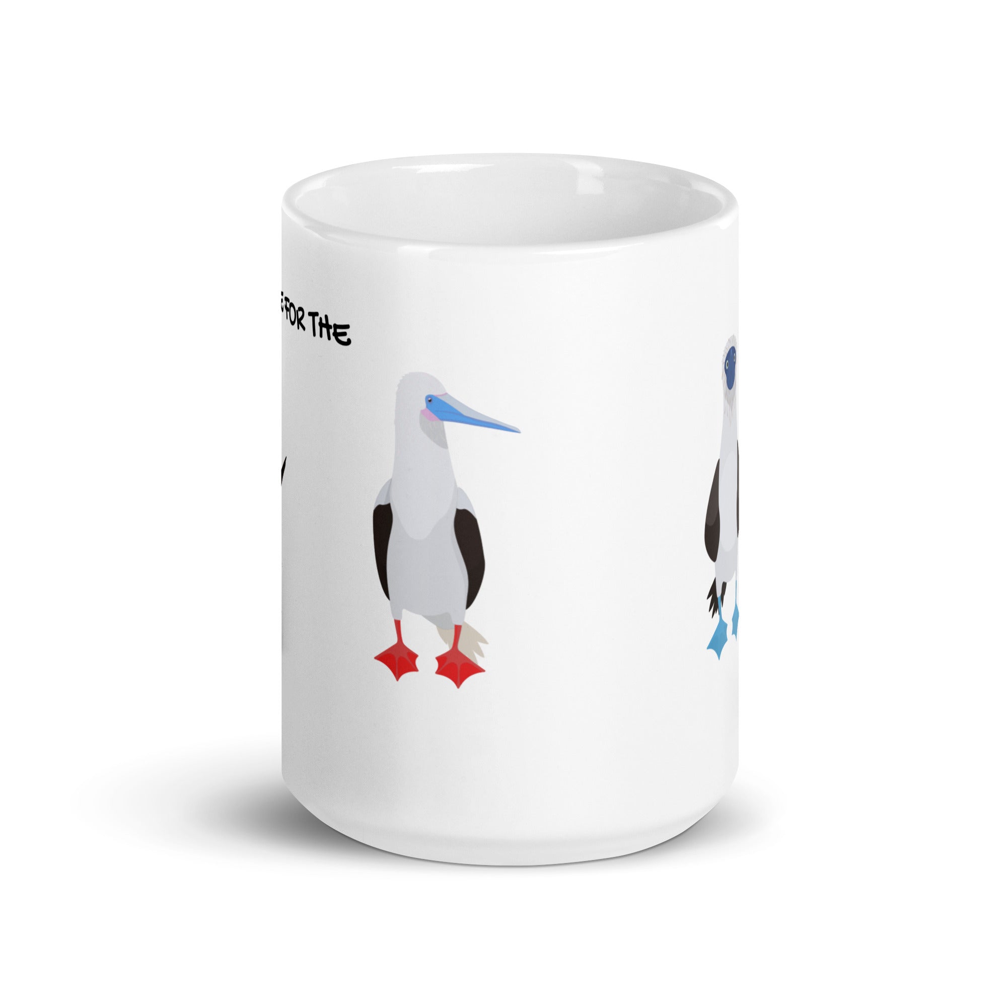 white glossy 15 ounce mug with illustrations of the blue-footed, red-footed and brown booby and the words, "I'm just here for the Sulidae." Mug handle to the back and not shown.