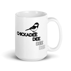 15 oz white Chickadee mug with handle to the right.