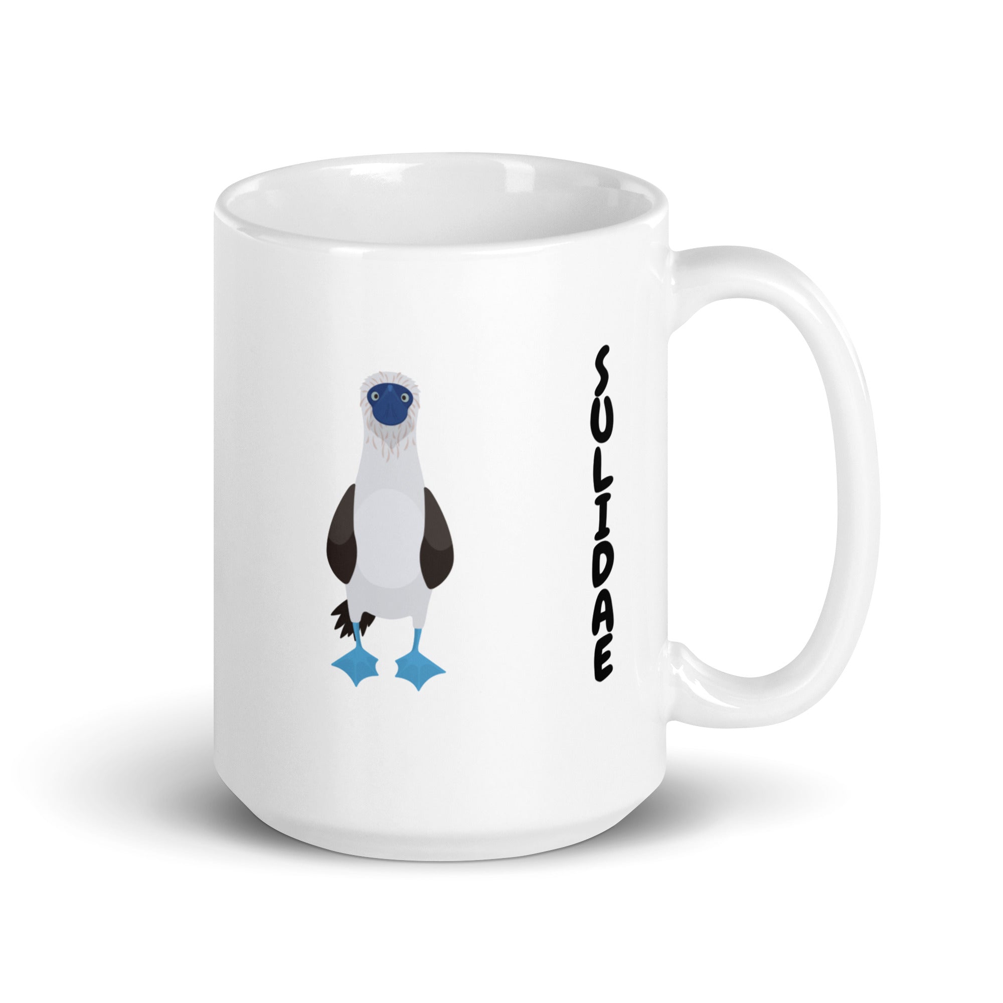 white glossy 15 ounce mug with illustrations of the blue-footed, red-footed and brown booby and the words, "I'm just here for the Sulidae." Mug handle to the right.