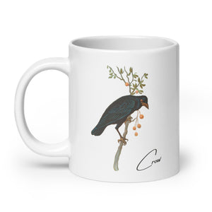 White 20oz mug with a vintage illustration of a Crow and the words "Crow" next to the bird.