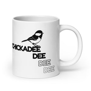 20 oz white Chickadee mug with handle to the right.