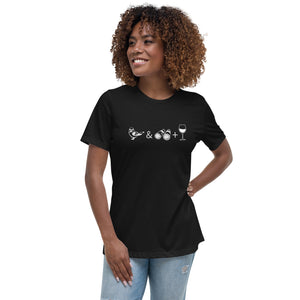 Black women's bird t-shirt celebrating bird watching and wine drinking with a graphic of binoculars, a bird, and a glass of wine. Worn by a woman.