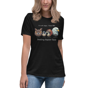 A black bird shirt with a great horned owl, a peregrine falcon, a red-tailed hawk and a bald eagle. The shirt has text that says, I'm not angry, I have RRF. Resting Raptor Face. Worn by a woman.