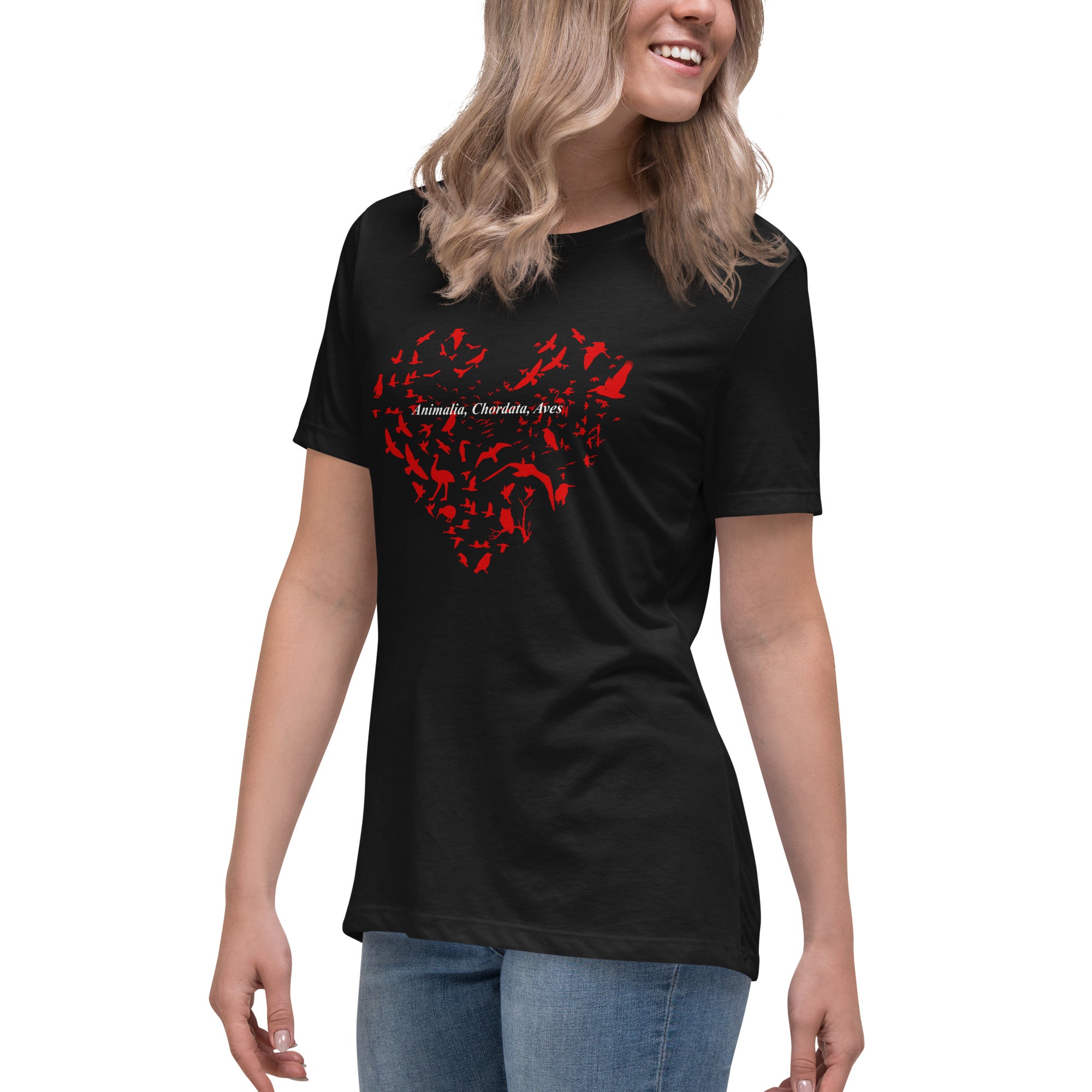 Black women's bird t-shirt with a bird silhouettes of many different types of birds in red and arranged so they make a heart shape, on top of that the words, "Animalia, Chordata, Aves". Worn by a woman.