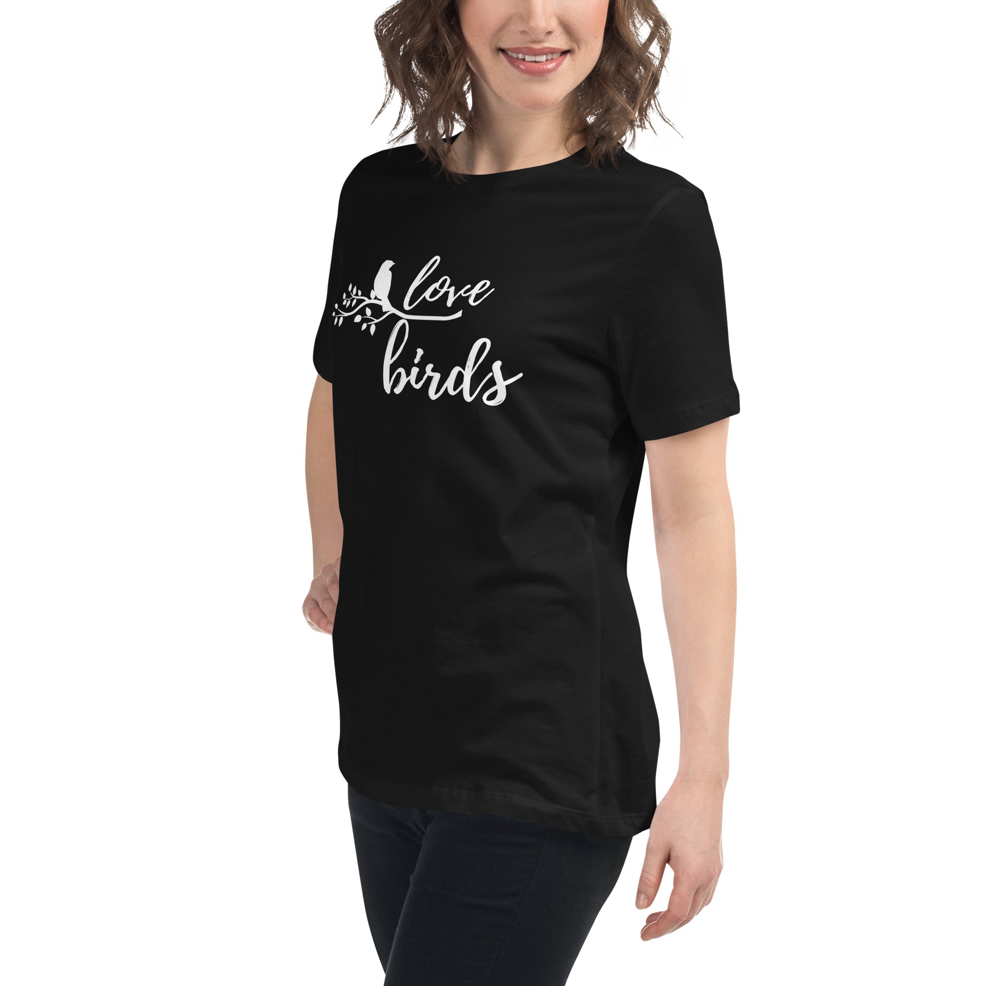 Black women's birding t-shirt with the words Love birds and a graphic of a bird on a branch in white. Worn by a woman.