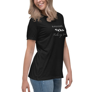 Black women's bird t-shirt with the words Birdsong feeds my soul placed above and below a white graphic of 4 birds on a branch. Worn by a woman.