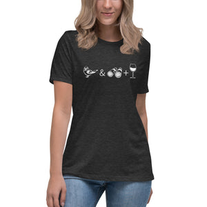 Dark heather gray women's bird t-shirt celebrating bird watching and wine drinking with a graphic of binoculars, a bird, and a glass of wine. Worn by a woman.