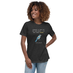 Dark heather gray women's bird shirt with the words I want these scrubs on the front above an illustration of a Florida scrub-jay. Worn by a woman.