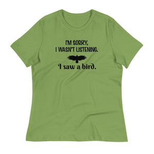 Light green women's bird t-shirt with the words I'm sorry I wasn't listening, I saw a bird. And a graphic of a bird flying.